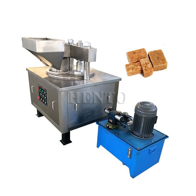 Biscuit compressing machine