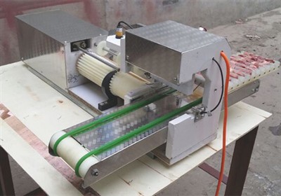 What is Automatic meat skewer threading machine?